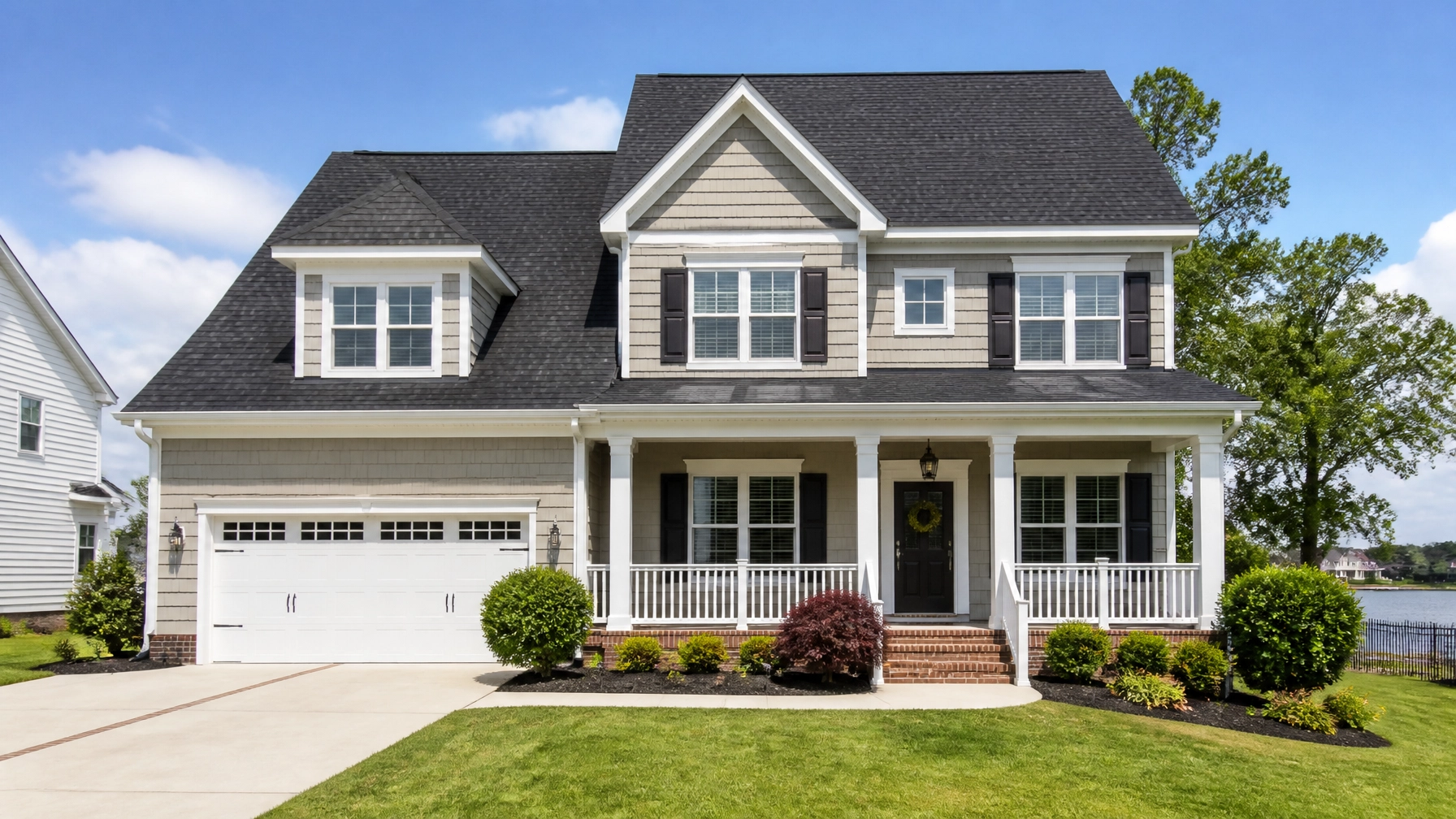 Architectural Shingles vs. Standing Seam Metal Roofing: The 2026 Norfolk VA Hampton Roads Material Showdown