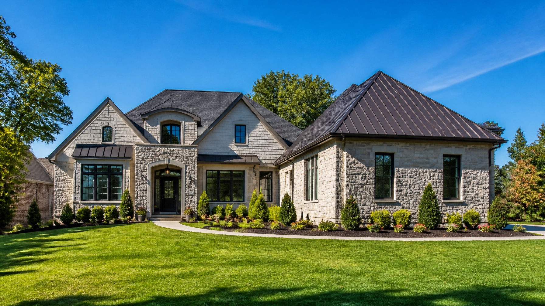 Architectural Shingles vs. Standing Seam Metal Roofing: The 2026 Indianapolis IN Material Showdown